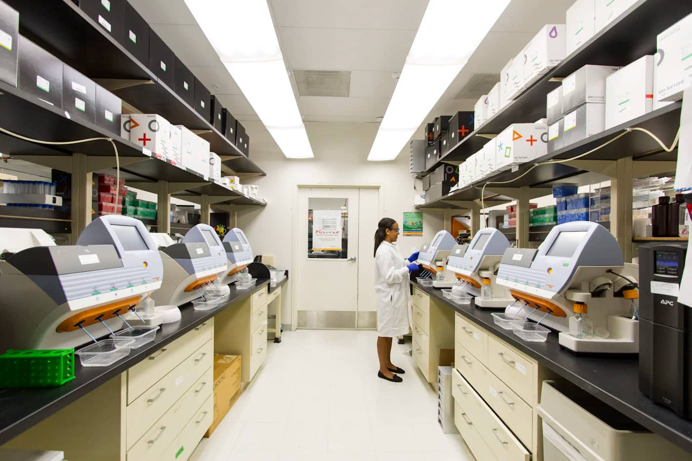 Hospital staff reviewing stock and equipment in a medical store